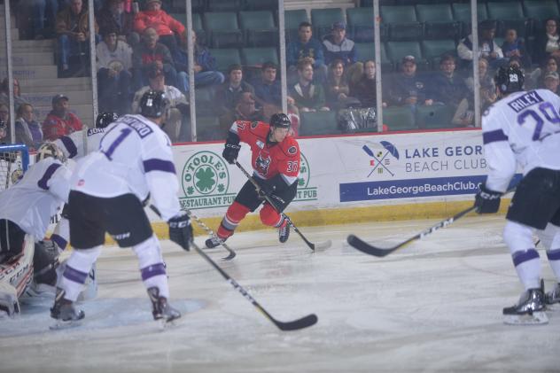 Adirondack Thunder defenseman Desmond Bergin (middle)