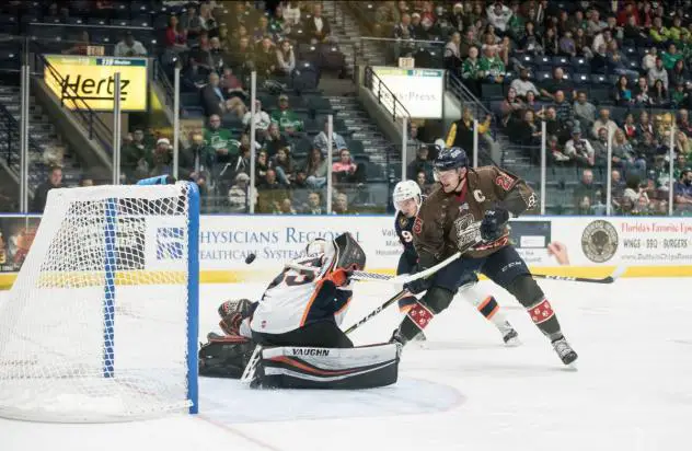 Florida Everblades forward John McCarron scores against the Greenville Swamp Rabbits