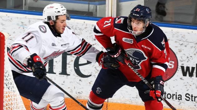Kitchener Rangers LW Nick McHugh (right) vs. the Oshawa Generals