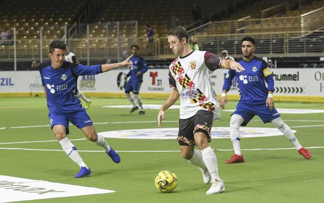 Josh Hughes of the Baltimore Blast maintains possession vs. the Orlando Seawolves