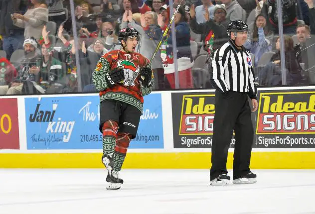 Jordan Kyrou of the San Antonio Rampage celebrates the eventual shootout-winning goal against the Iowa Wild