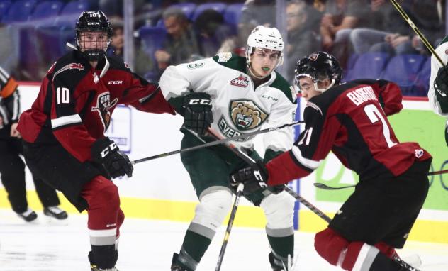 Vancouver Giants forwards Zack Ostapchuk (left) and Aidan Barfoot against the Everett Silvertips