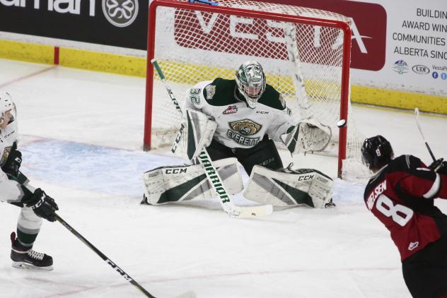 Vancouver Giants centre Tristen Nielsen takes a shot against Everett Silvertips goaltender Dustin Wolf