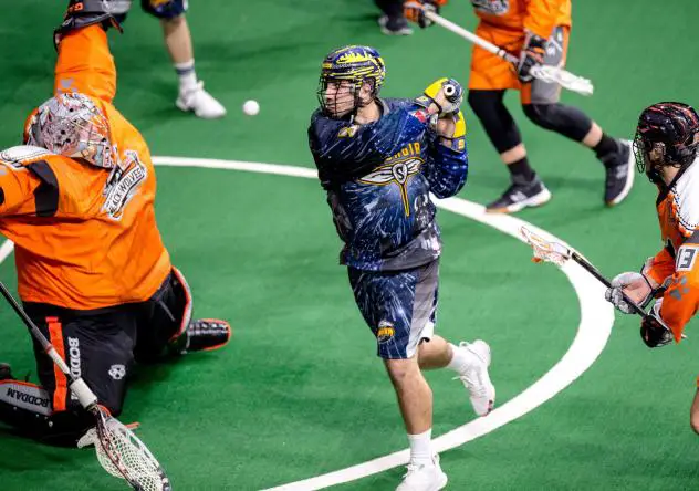 Holden Cattoni of the Georgia Swarm (center) vs. the New England Black Wolves