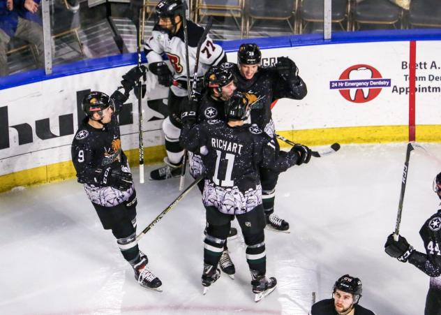 Utah Grizzlies celebrate a goal against the Rapid City Rush