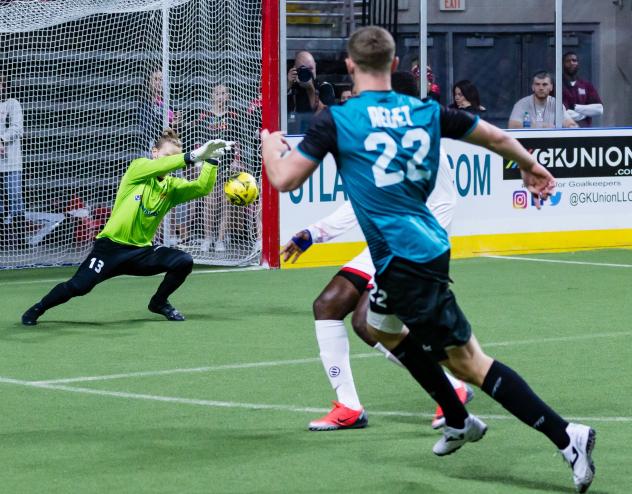 St. Louis Ambush forward Zach Reget races to the ball