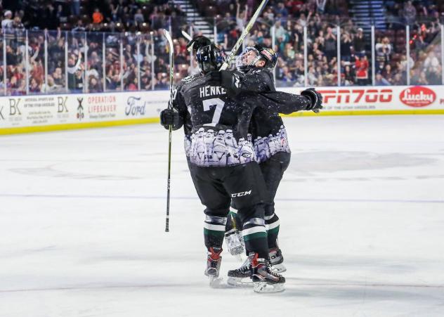 JT Henke and the Utah Grizzlies celebrate a goal