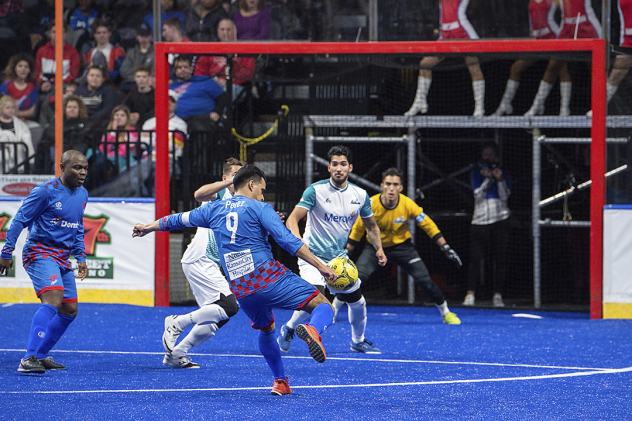 St. Louis Ambush goalkeeper Paulo and his defense face the Kansas City Comets