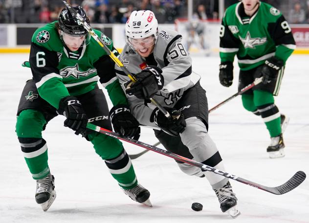 Nolan Stevens of the San Antonio Rampage (58) battles against Texas Stars defenseman Ben Gleason