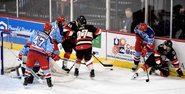 Allen Americans battle the Cincinnati Cyclones behind the Allen net