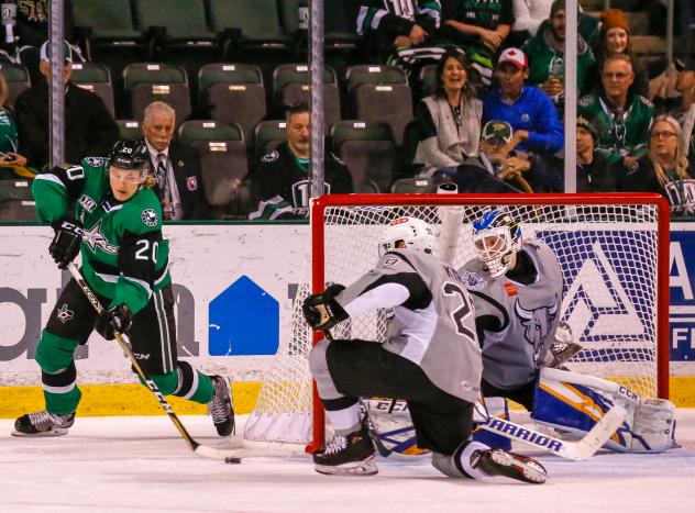 Joey LaLeggia defends the front of the San Antonio Rampage net against Roope Hiintz of the Texas Stars