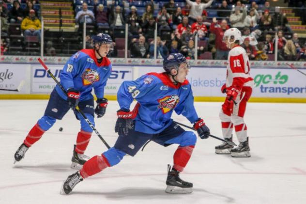 Saginaw Spirit celebrate against the Soo Greyhounds