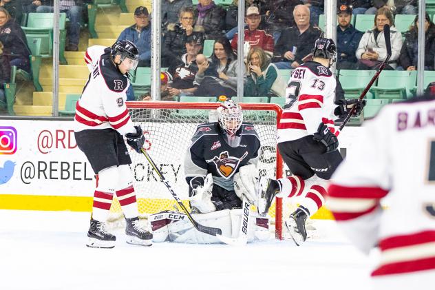 Vancouver Giants goaltender David Tendeck holds the Red Deer Rebels at bay