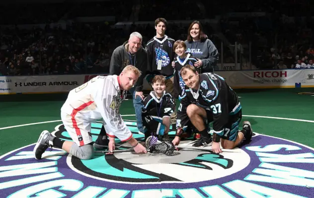 Jacob Quinn (center) at the Rochester Knighthawks ceremonial faceoff