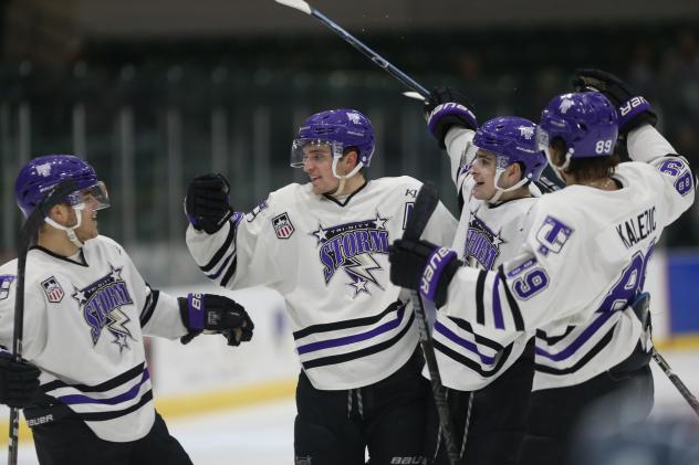 Tri-City Storm celebrate against the Omaha Lancers