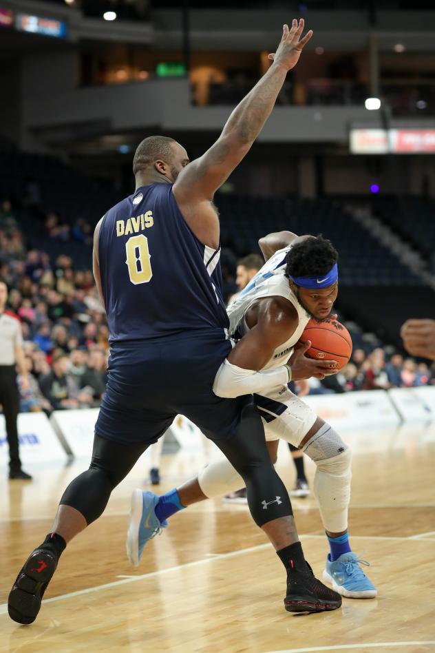 Halifax Hurricanes drive to the basket against the St. John's Edge