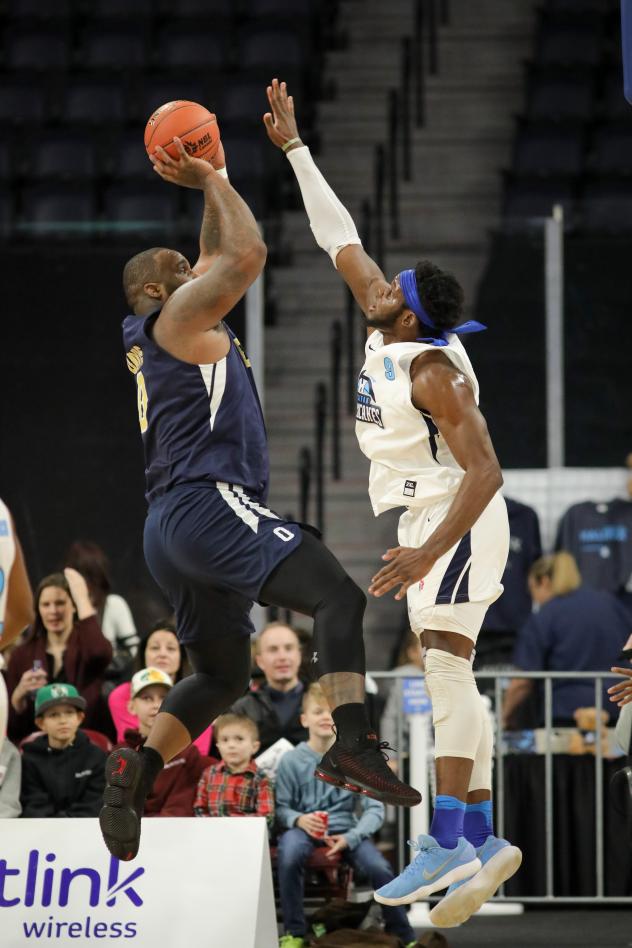 Halifax Hurricanes center Rhamel Brown contests a shot against the St. John's Edge