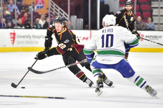Cleveland Monsters LW Sonny Milano handles the puck against the Utica Comets
