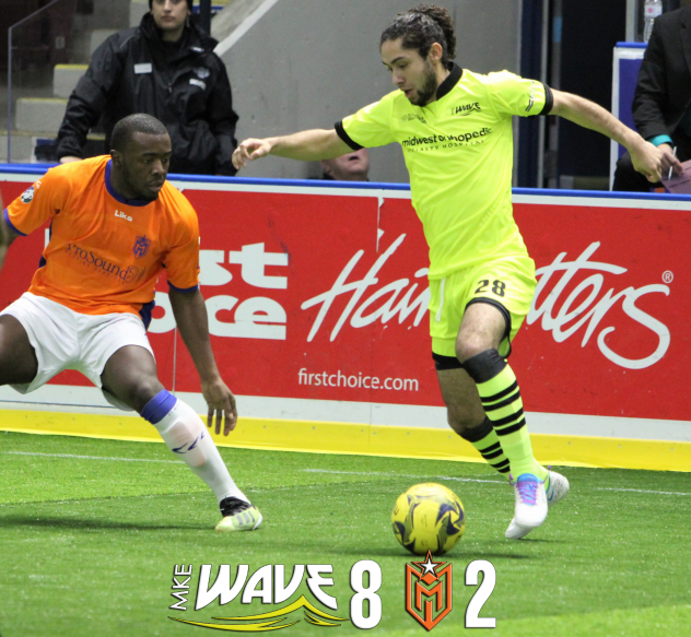 Angel Curiel of the Milwaukee Wave (right) against the Mississauga MetroStars