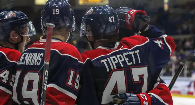 Owen Tippett of the Saginaw Spirit receives congratulations from his new teammates