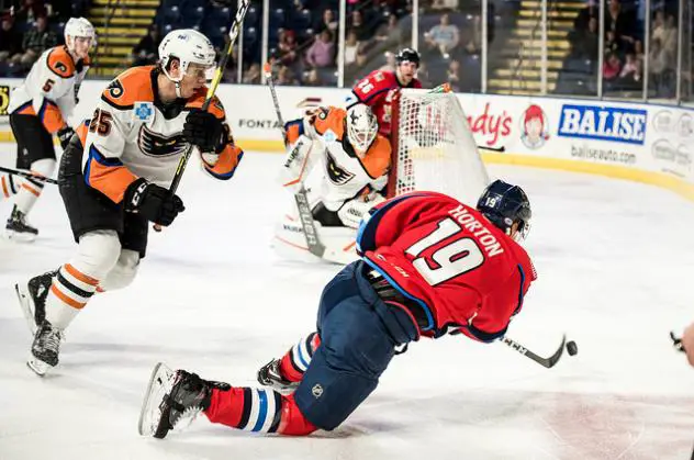 Lehigh Valley Phantoms center Connor Bunnaman (left) eyes the Springfield Thunderbirds