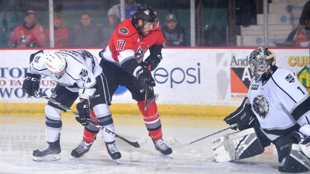 Adirondack Thunder forward Alexandre Carrier tests the Manchester Monarchs goaltender