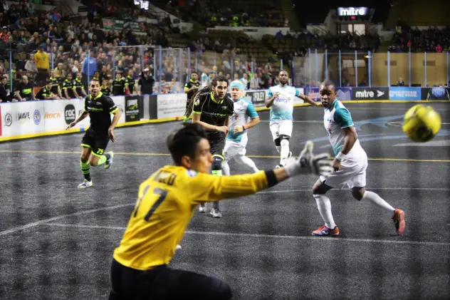 St. Louis Ambush goalkeeper Paulo lunges for a Milwaukee Wave shot attempt