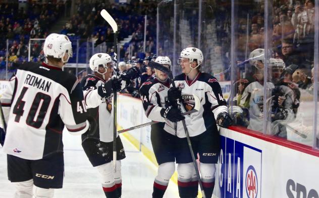 Bowen Byram and his Vancouver Giants teammates celebrate a goal