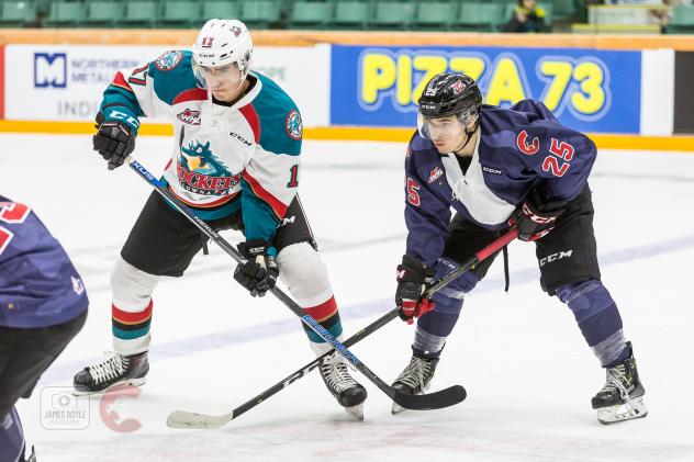 Kelowna Rockets center Alex Swetlikoff (left) against the Prince George Cougars