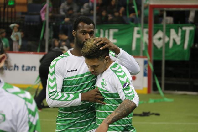 Dallas Sidekicks walk off the field after a loss