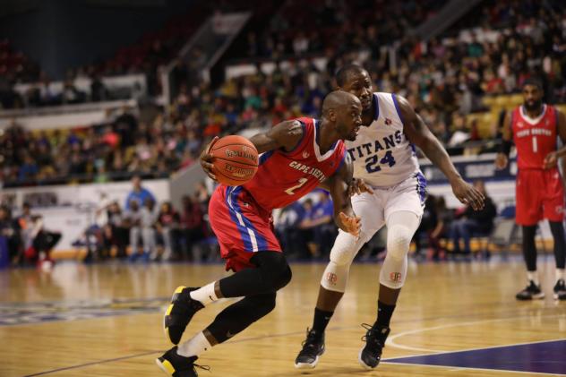 Cape Breton Highlanders guard Olu Famutimi drives against the KW Titans