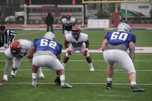 Anthony Rhone of the Memphis Express meets the Salt Lake Stallions in a joint practice