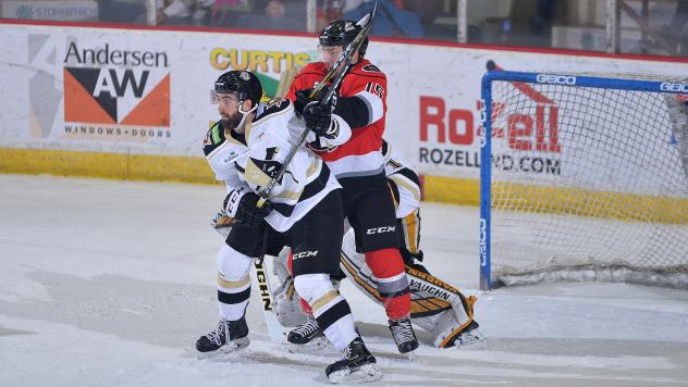 Adirondack Thunder forward James Henry sets up in front of the Wheeling Nailers goal