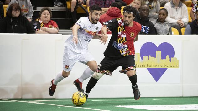 Adriano Dos Santos of the Baltimore Blast (right) defends against the Harrisburg Heat
