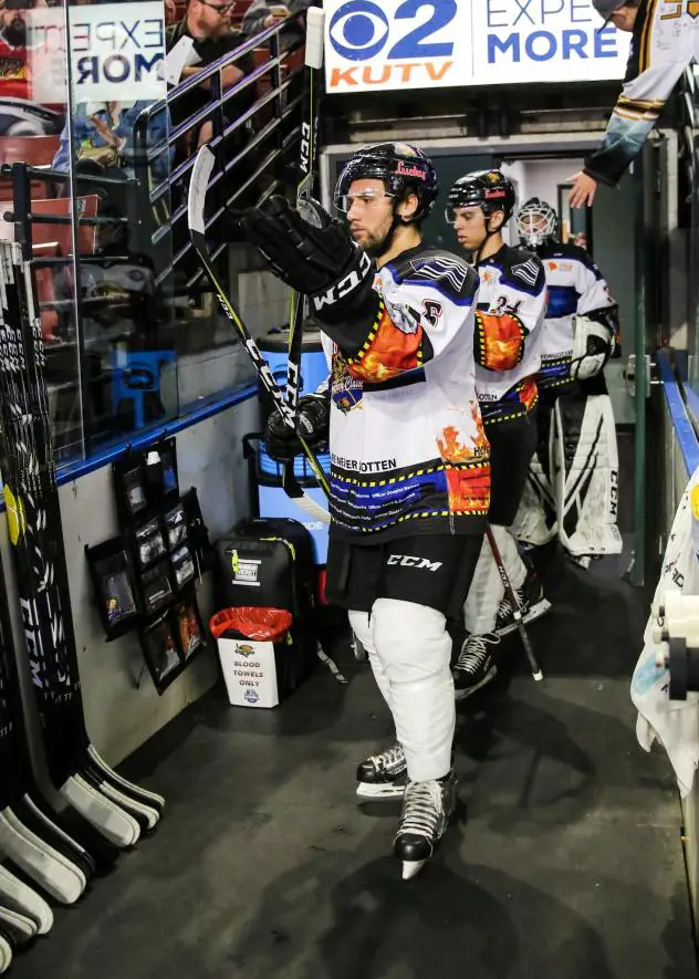 Utah Grizzlies enter the ice in their Guns N Hoses jerseys against the Tulsa Oilers