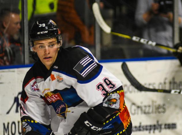 Joey Raats of the Utah Grizzlies in his Guns N Hoses jersey