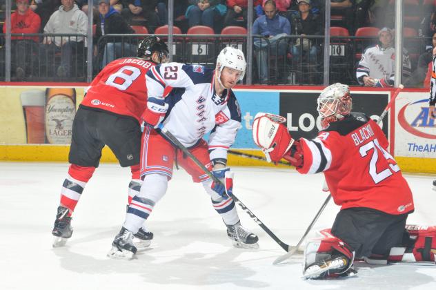 Binghamton Devils goaltender Mackenzie Blackwood makes a stop against the Hartford Wolf Pack