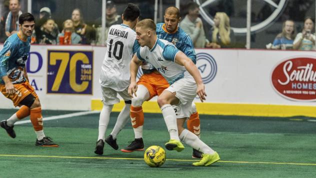 St. Louis Ambush control the ball against the Florida Tropics