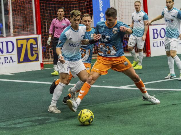 St. Louis Ambush eye the ball against the Florida Tropics