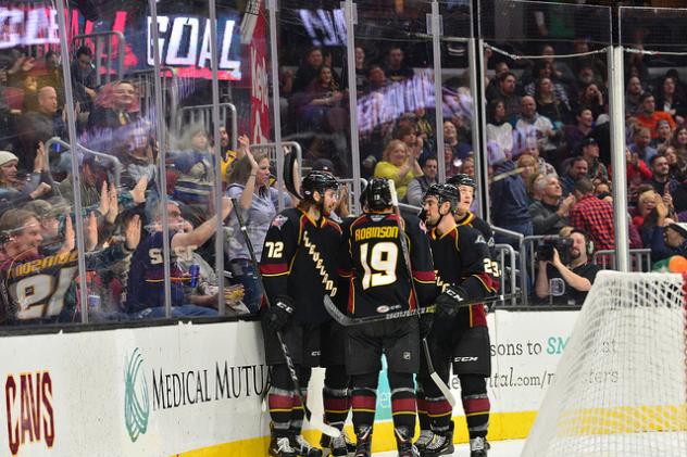Cleveland Monsters celebrate a goal against the Chicago Wolves