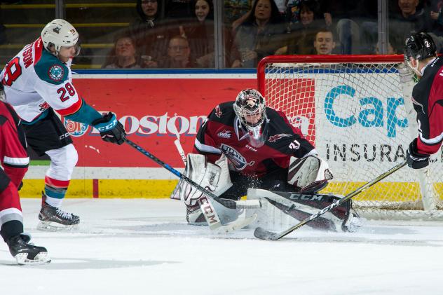 Vancouver Giants goaltender Trent Miner stops a shot from the Kelowna Rockets