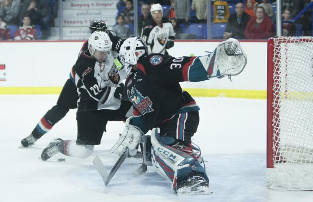 Kelowna Rockets goaltender Roman Basran stops the Vancouver Giants