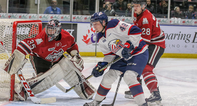 Saginaw Spirit right wing Jake Goldowski sets up in front of the Guelph Storm net