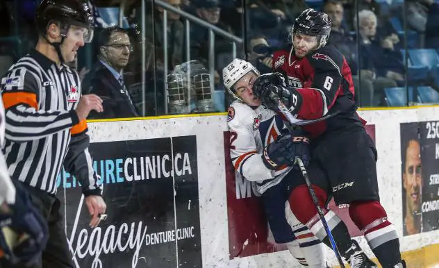 Vancouver Giants defenceman Bowen Byram crushes a member of the Kamloops Blazers