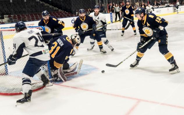 Norfolk Admirals right wing Ben Duffy (right) looks for an opening vs. the Norfolk Admirals