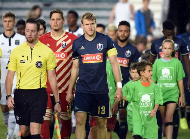Defender Connor Tobin enters the pitch with North Carolina FC
