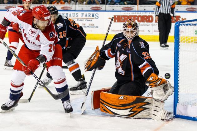 Spencer Asuchak of the Allen Americans scores against the Kansas City Mavericks