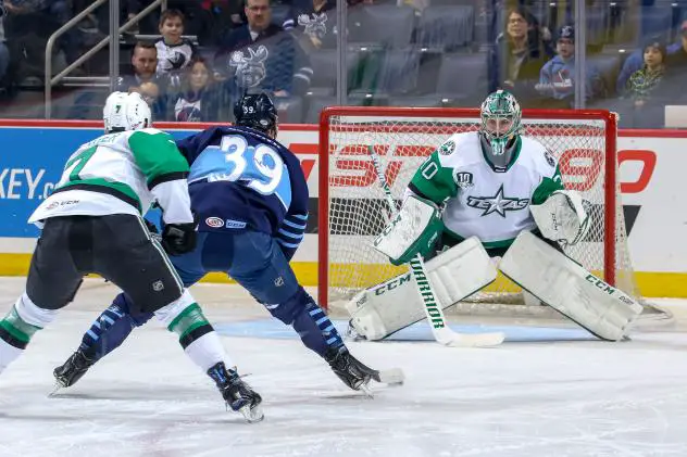 Texas Stars Goaltender Philippe Desrosiers faces the Manitoba Moose