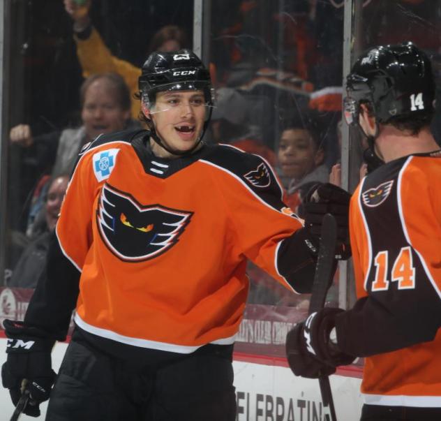 Lehigh Valley Phantoms exchange congratulations after a goal