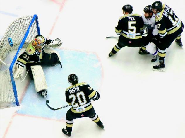 Wheeling Nailers goaltender Jordan Ruby and his defense stop the Reading Royals